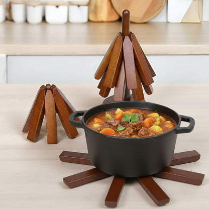 50 % rabatt på Underlägg i bokträ för varma rätter och kastruller - 4 st. trebenade underlägg + 1 st. hållare 